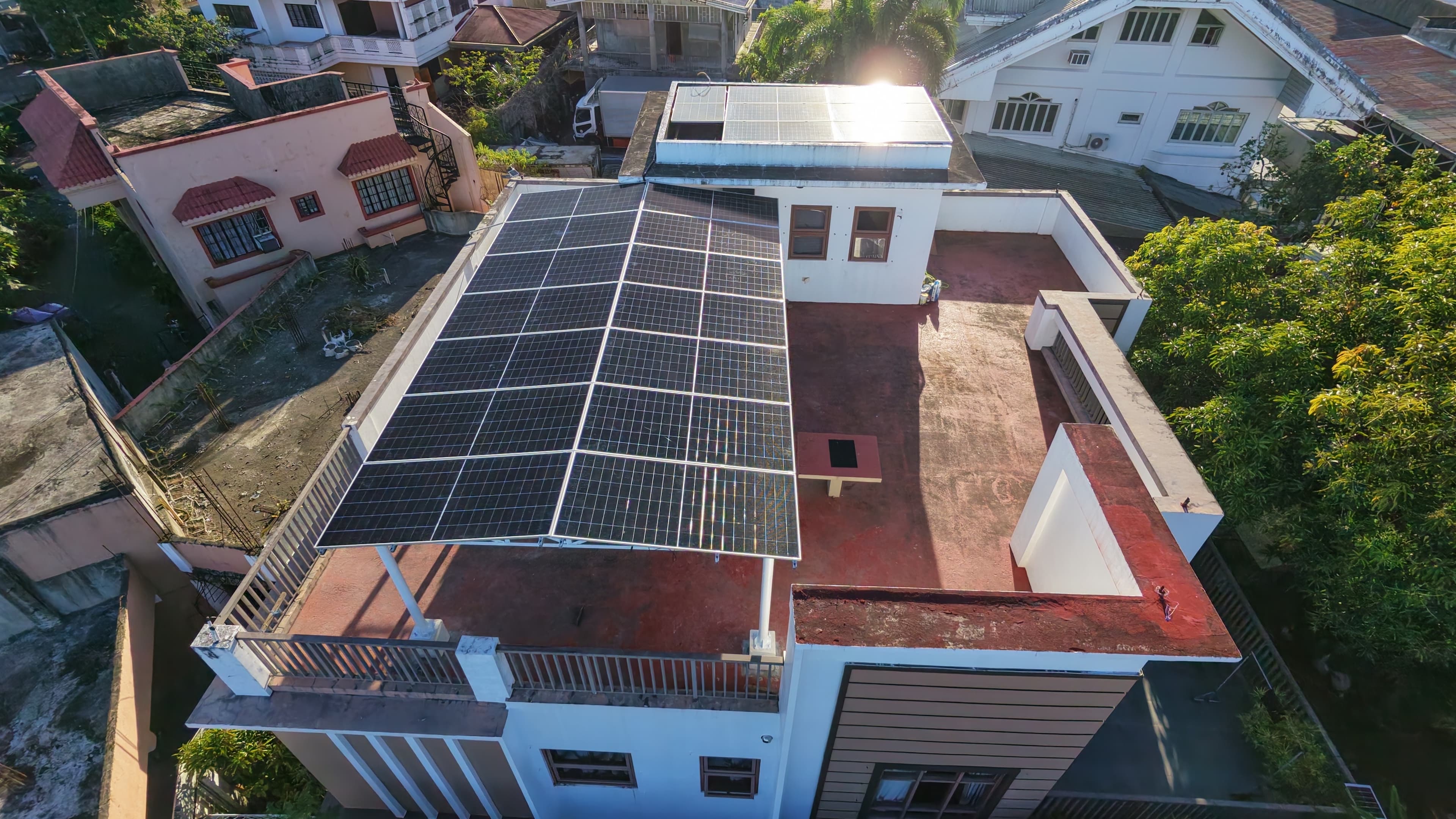 Aerial view of a residential solar canopy installation